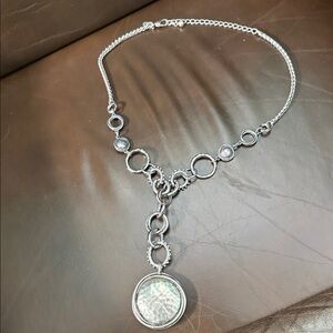 Elegant Silver Necklace with Circular Pendant